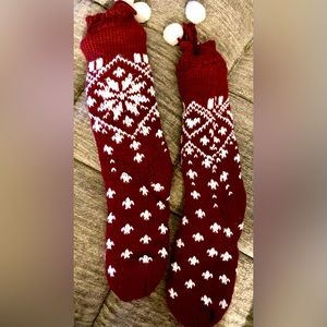 Bootie socks with pom poms.